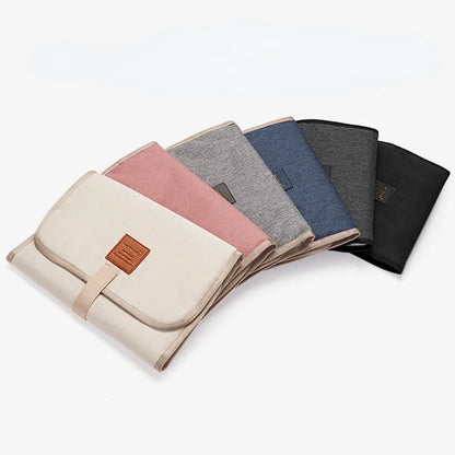 Fasciatoio Portatile Pieghevole Impermeabile. Cambio Pannolino Ovunque in Sicurezza